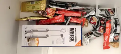 a drawer filled with trash and a box of food at Daisy Apart SKI OUT SKI IN Vila Bela Reka Brzece in Brzeće