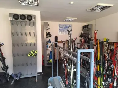 a room with skis and ski equipment in it at Apartment Aleksandar AS in Brzeće