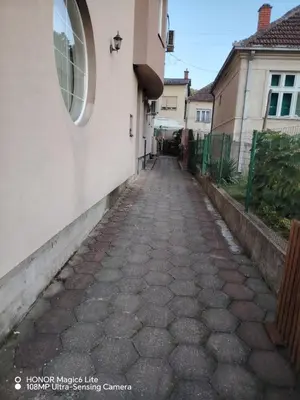 an alleyway between two buildings in a house at Sunce in Ribarska Banja