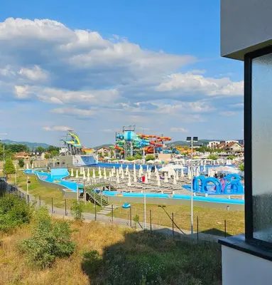 a water park with a large pool and slides at Apartmani Giga in Vrnjci