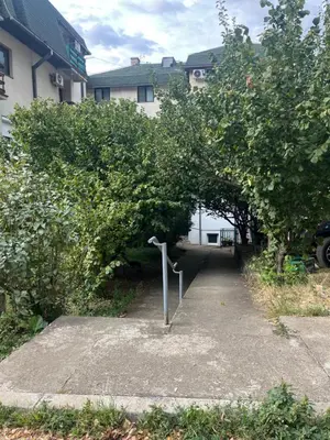 an apple tree archway in a parking lot at Golding Lux in Soko Banja