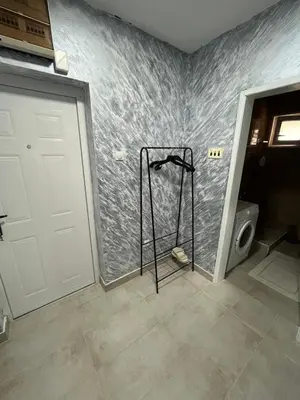 a room with a bathroom with a door and a toilet at Golding Lux in Soko Banja