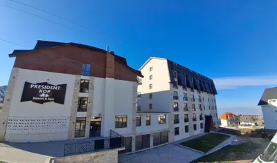 a building with a sign on the side of it at Kopaonik,President kop Katarina free wellness&spa in Kopaonik
