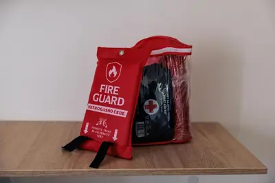 a red fire guard bag sitting on a shelf at WellNest Niš Self Check-in & Parking I Moderan, miran apartman plus radni kutak in Niš