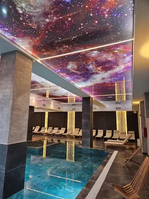 a room with a ceiling with a universe at UN lux - Residence Hill in Kopaonik
