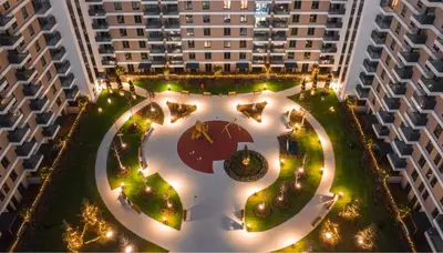 an overhead view of a courtyard in a building with lights at Skyline Lux Apartment by Planet Residence in Niš