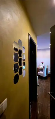 a room with a wall with some shelves on the wall at Magic Apartman Kop - Kraljevi Cardaci in Kopaonik