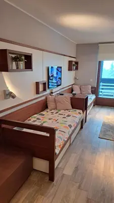 a bedroom with two beds in a room at Apartman Bjanka 308 in Kopaonik
