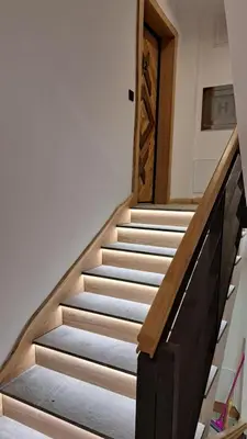 a set of stairs in a house at Apartmani U CASA DI LEGNO 2,5,8,11 in Kopaonik