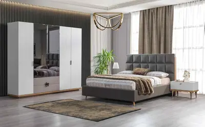 a bedroom with a bed and a large mirror at Magic house in Bukorovac