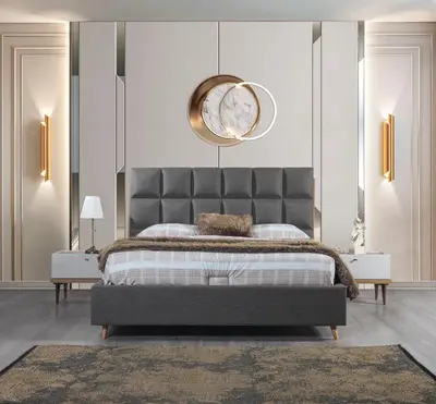 a bedroom with a bed with a clock on the wall at Magic house in Bukorovac