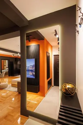 a living room with a large tv in the middle at T & T Apartman - 2 bedrooms in Pirot