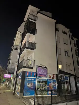 a white building with balconies on the side of it at Golden Crown 2 in Vranje