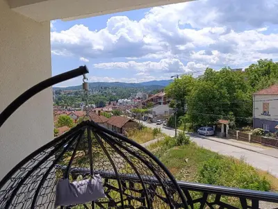 a view of a city from a balcony at Apartman Hedon in Vrnjačka Banja