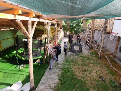a group of people standing under a tent at Apartman Marina i Sobe Luka in Bukorovac