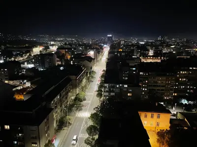 a view of a city at night at Panorama centar, free parking in Niš