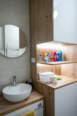 a bathroom with a sink and a mirror at 365stay in Vranje