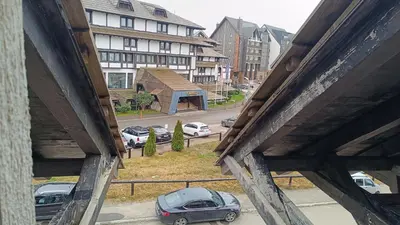 a view of a car parked in a parking lot at Vila Mecava Centar in Kopaonik