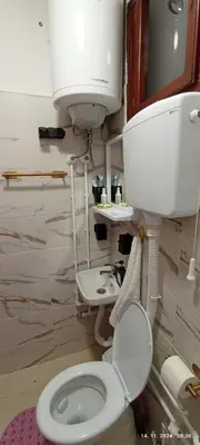 a bathroom with a toilet and a sink at Deda Bocin konak