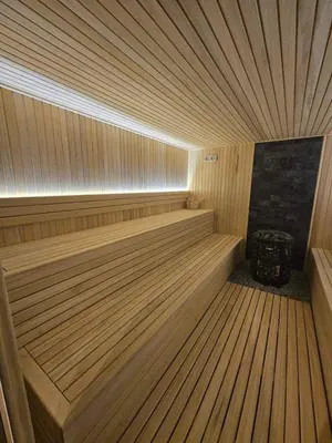 a small wooden sauna with a television in it at Apartman SEVN in Kopaonik
