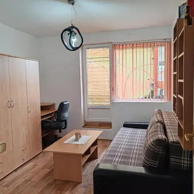 a living room with a couch and a table at Merak stan na dan in Vranje