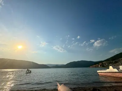 a group of people swimming in a large lake at Bovanska Oaza 2 - Bovansko jezero in Aleksinac