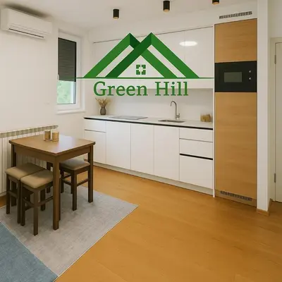 a kitchen with a green hill sign on the wall at Luxury Stay in Vrnjačka Banja C1 in Vrnjačka Banja