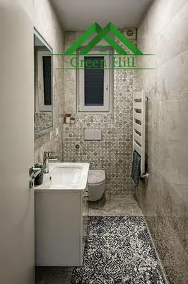 a bathroom with a sink and a toilet at Luxury Stay in Vrnjačka Banja C1 in Vrnjačka Banja