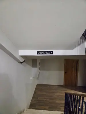 a sign on the ceiling of a room at Apartman Mist C113 - Bela Reka in Brzeće