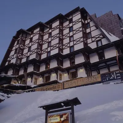a building on top of a snow covered mountain at Vila Gorica - Planinska kuca in Kopaonik