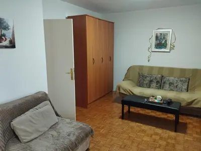 a living room with a couch and a coffee table at DiO in Kruševac
