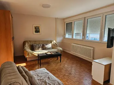 a living room with a couch and a table at DiO in Kruševac