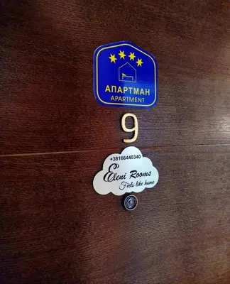 a tag that says air australian parliament on a suitcase at DeLux apartman Eleni rooms in Vrnjačka Banja