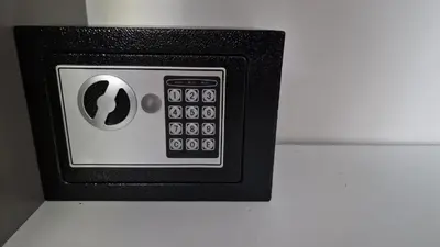 a black and white microwave with a control panel at DeLux apartman Eleni rooms in Vrnjačka Banja