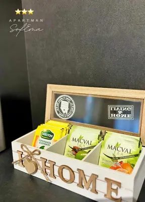 a wooden box filled with different types of food at Sofema in Pirot