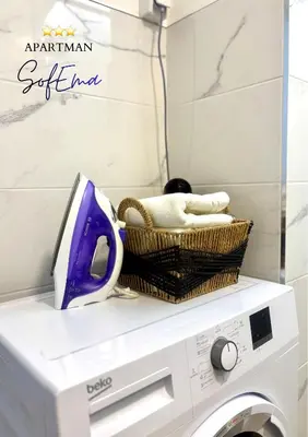 a laundry room with a washer and dryer at Sofema in Pirot