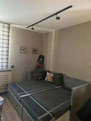 a bedroom with a bed in a room at Apartman Stemaks, Kopaonik in Kopaonik