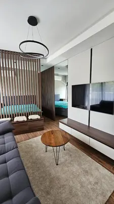 a living room with a couch and a coffee table at Apartman Vrabac in Vrnjačka Banja