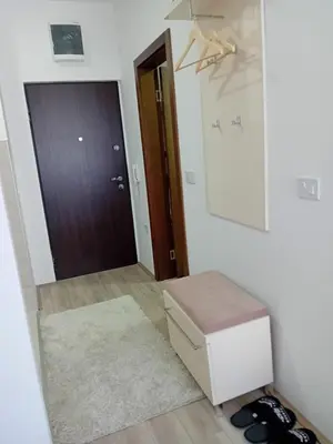 a room with a hallway with a door and a box at Apartman Akva Park in Trnava