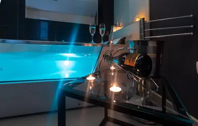 a glass table with a camera on top of it at NAR Royalton Deluxe Apartment #40 Free Parking in Niš