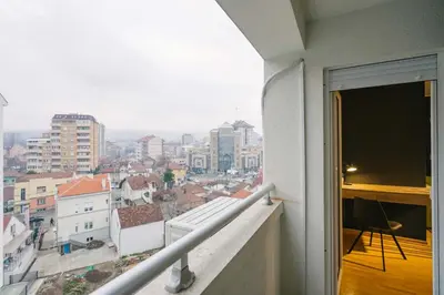 a balcony with a view of a city at NAR Royalton Apartment #60 Free Parking in Niš