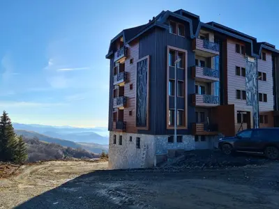 a building on the side of a mountain at Vila Golija Sky View Kopaonik in Kopaonik