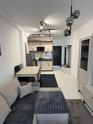 a living room with a couch and a table at Nik 1 in Kruševac
