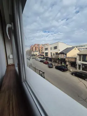a view of a city street from a window at Zira apartman in Vranje