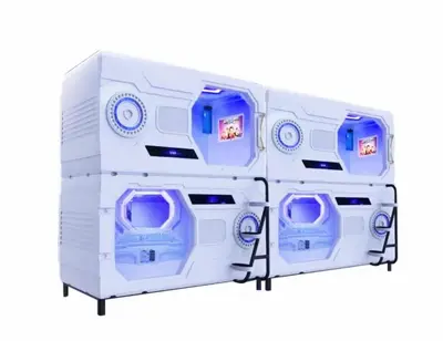a set of three machines with blue seats at Belgrade Airport Space Capsule Beds in Bukorovac