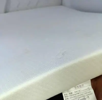 a white mattress with a price tag on it at Belgrade Airport Space Capsule Beds in Bukorovac