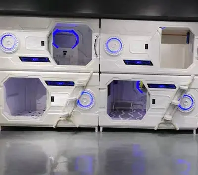 a white box withartments on a shelf on a table at Belgrade Airport Space Capsule Beds in Bukorovac