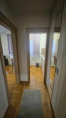 an empty room with a hallway leading to a living room at Vera Solaris in Vrnjci