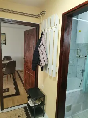 a bathroom with a shower and a tub and a door at Mala Sirena in Bukorovac