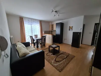 a living room with a couch and a table at VILA KRUNA Apartments in Kopaonik